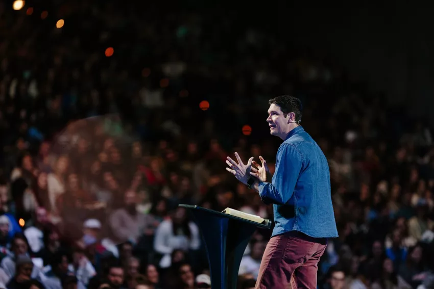 Matt Chandler preaching on stage